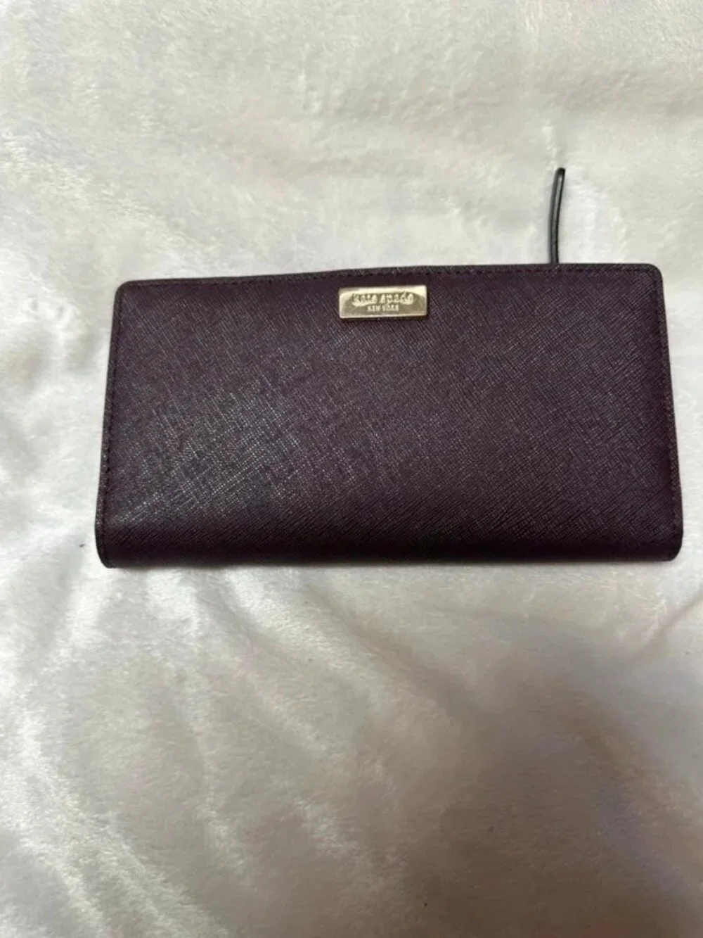 kate spade plum textured zip-around wallet with gold logo
